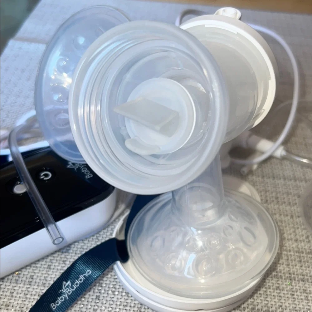 Baby Buddha Portable Breast Pump + supplies & bonus Zomee portable pump